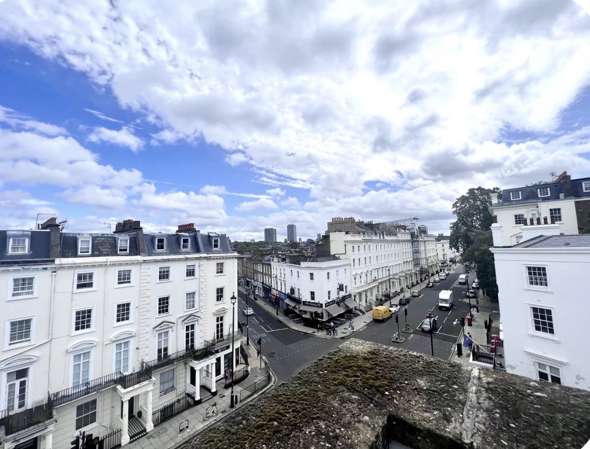 Rooftop view over the white stucco terraces of Pimlico towards central London